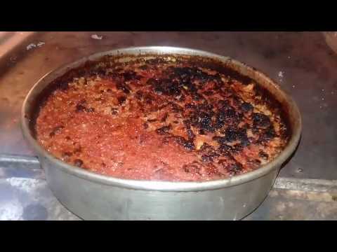 فيديو: طاجن أرز مع قاروص وطماطم