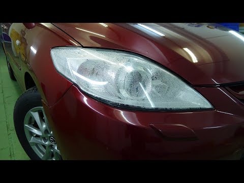 Vídeo: Com s’ajusten els fars d’un Mazda 5?