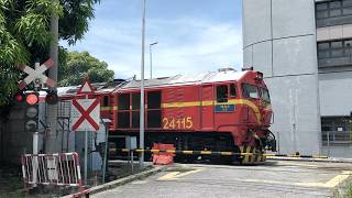 KTM Class 24 diesel locomotive 24115 passing Penang Sentral railway crossing,2026