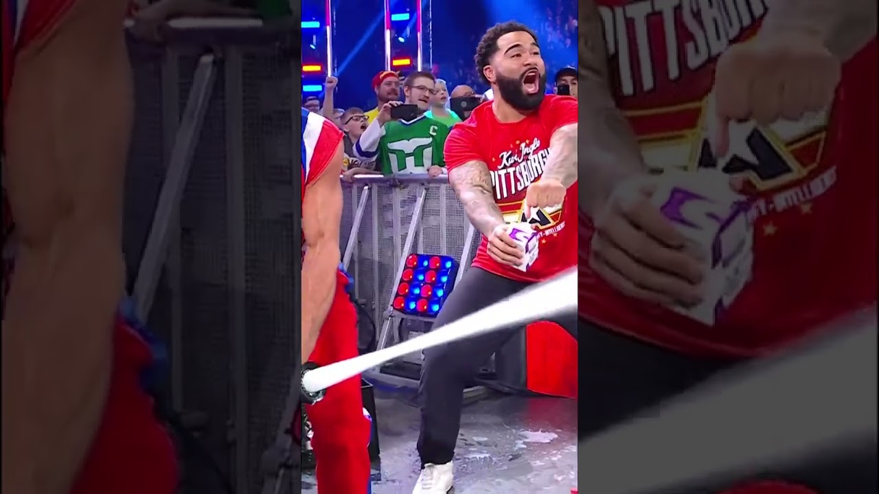 Kurt Angle sprays milk on Alpha Academy 