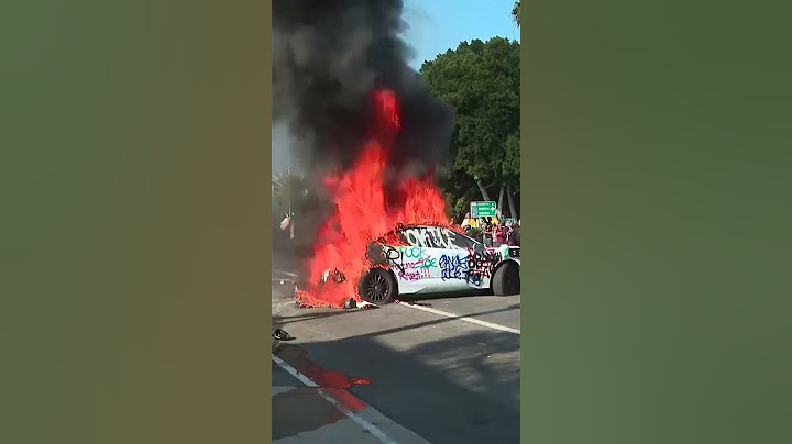 Protesters set Waymo cars on fire in Los Angeles anti-ICE protests | REUTERS
