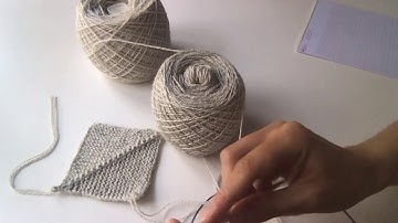 Add the next square and pick up stitches along one side - knitting a blanket