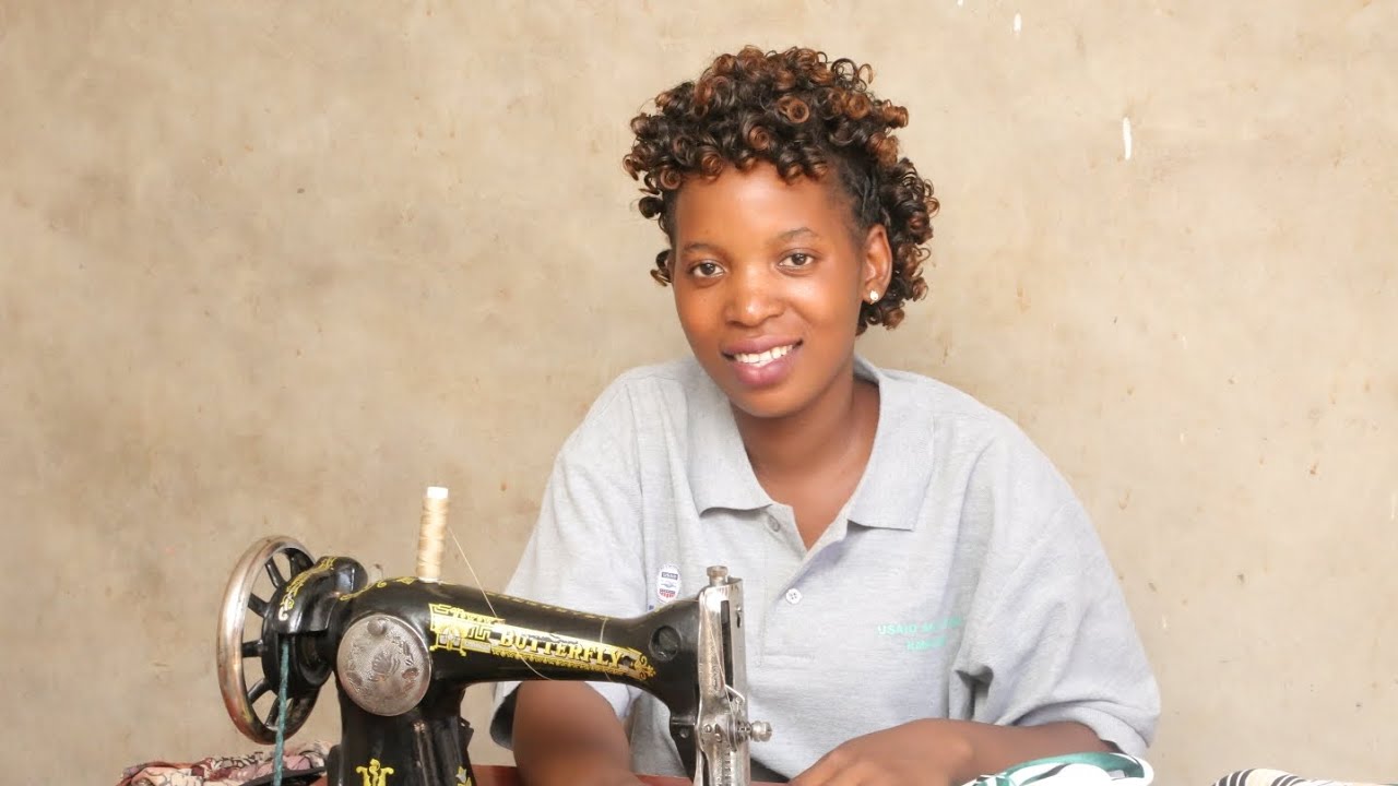 Ninamiliki cherehani na ofisi yangu ya ushonaji kupitia mradi wa USAID ...