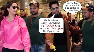 Varun Dhawan PUSHES A Fan From Shraddha Kapoor for touching her INAPPROPRIATELY At the Airport