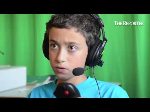 7th grader Ben Jimenez 'flies' using a simulator in a Pennbrook Middle School technology classroom