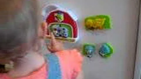 Isabella Playing with her magnet birthday gift