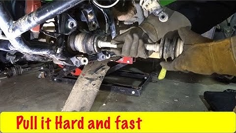 How to Remove a ATV Axle