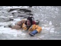 Raw: Firefighters Rescue Family Dog in Icy River