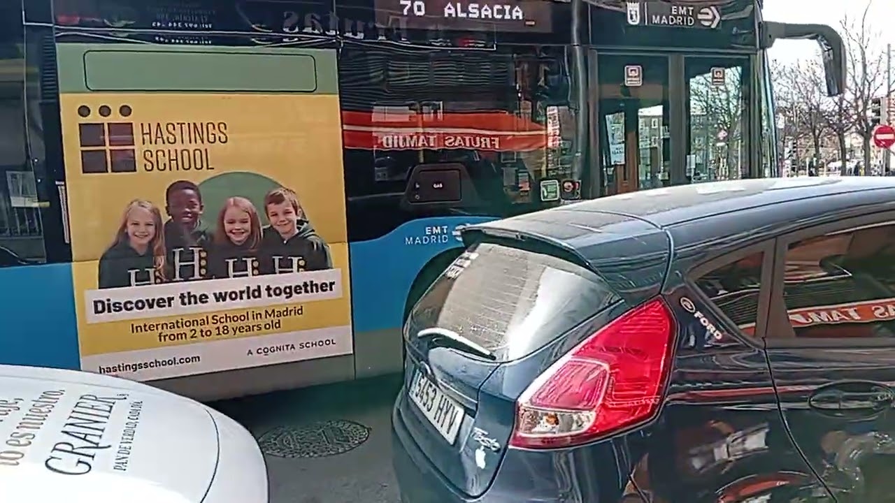 Here is the Emt bus 587 on the number 70 in Madrid Wednesday 25 February 2026 