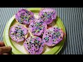 Eat purple vanilla frosting spread on mini bagels