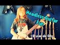 Headless Guitar - 10 year old Olly plays EART GW2 behind head.