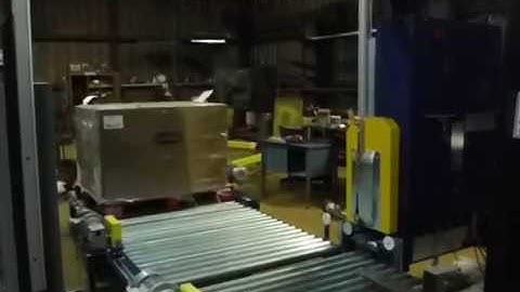 Newell automatic side seal strapping station