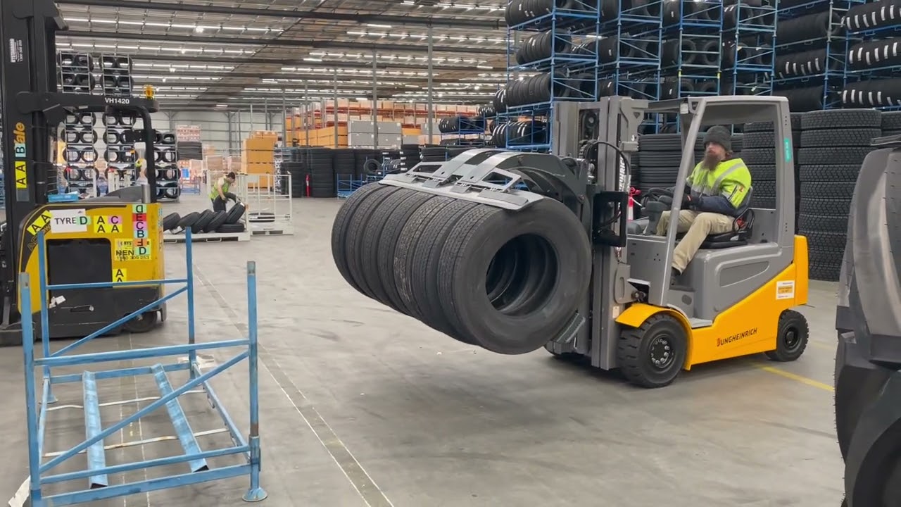 Warehouse tyre handler - Clamp - Stack - Rotate & Rack