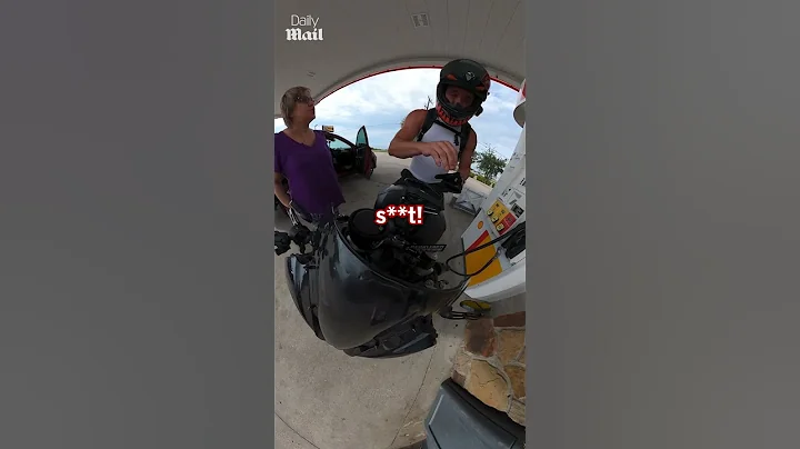 Angry woman confronts biker after he pulled into gas station