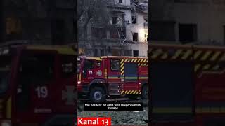Ukrainian firefighters respond as apartment blocks damaged by Russian strikes on Dnipro