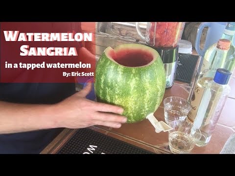 Watermelon Sangria in a tapped watermelon