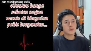 KUMPULAN DUSTA/Erie suzan cover by Ramdhani versi lirik vidio (hits musik paling asiik)🎵