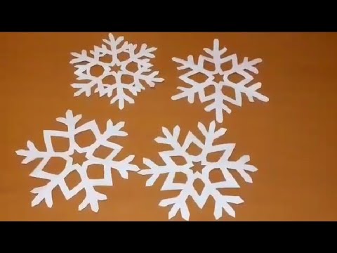 Videó: Gyönyörű hópelyheket vágtunk ki a papírból saját kezünkkel