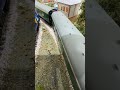 Bude passes the signal box.