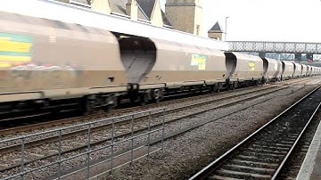 Freightliner class 66595 with empty HHA coal wagons