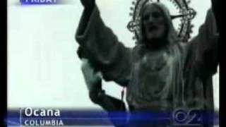 Man falls from a statue of Jesus