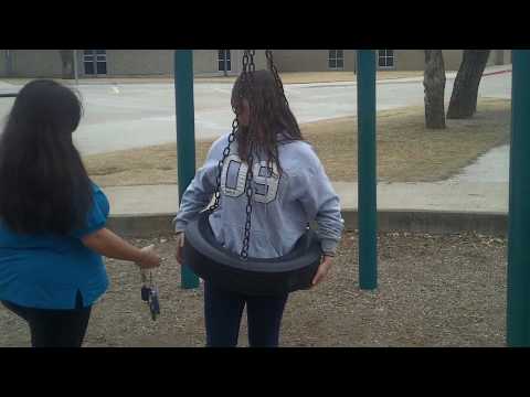 Ashley stuck in the tire swing