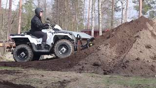 Latvo´s hydraulic plow bucket with Polaris ATV