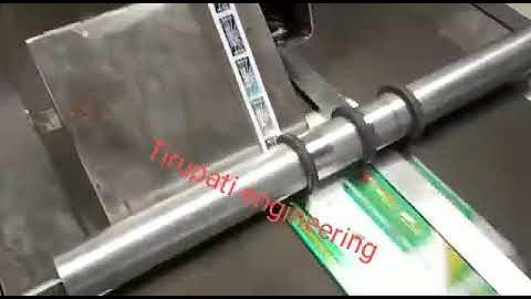 Automatic feeder conveyor machine with label applicator Machine