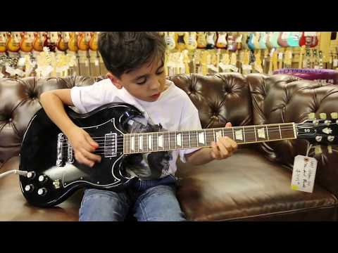 8yearold Jayden Tatasciore playing our Gibson SG Standard here at Norman39s Rare Guitars