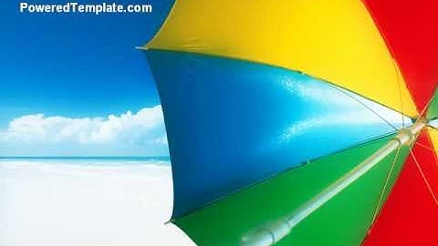 Umbrella on the Beach PowerPoint Template by PoweredTemplate.com