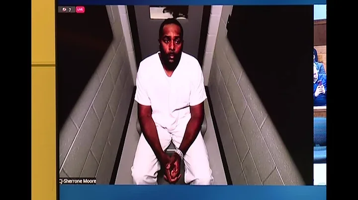 Fired Michigan football coach Sherrone Moore appears in court from jail