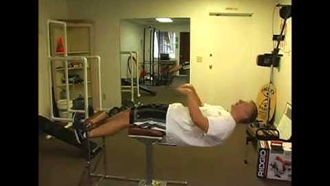 Doing a GHD Sit Up Core Body Exercise