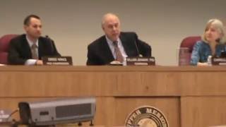 Talking at township meeting about police salaries