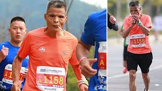 MAN RUNS MARATHON WHILE SMOKING CIGARETTES...