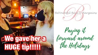 Giving a huge tip to our waitress for Christmas