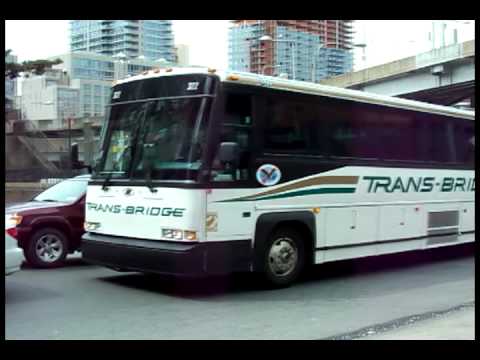 Greyhound Prevost and Trans bridge MCI