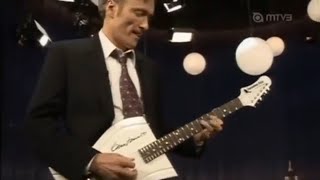 A Finland show gives a guitar to Conan as a gift and he plays it😍 (I think he is a guitar addict 😂)