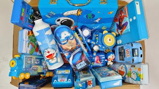 Box full of blue stationery - doraemon pencil box, art set, water bottle, pencil sharpner, crayons