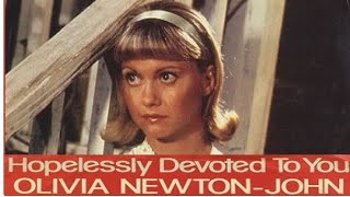 Video thumbnail of "Olivia Newton John - Hopelessly Devoted To You (Lyrics)(video)"