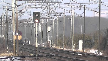 DB Schenker Skip with Rake of  ex works Mk IVs and DVT