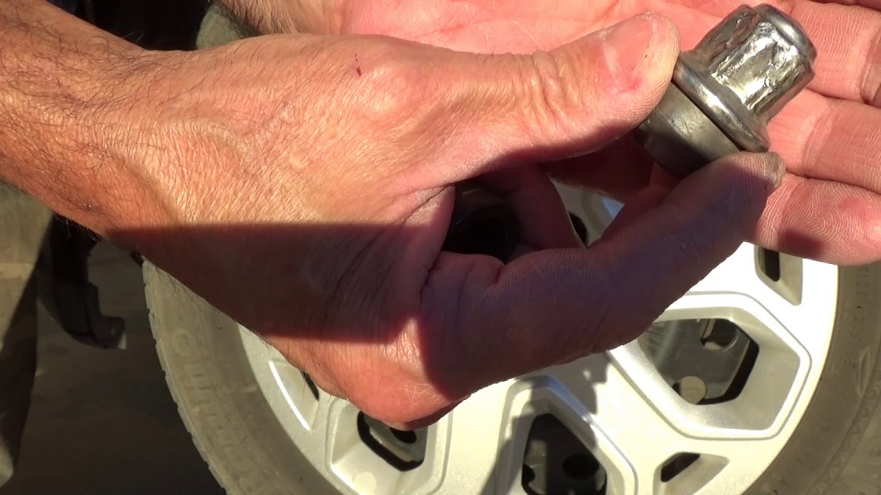 How To Remove Worn Out Rounded Lug Nuts The Easy Way - YouTube