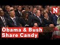 Michelle obama and george w bush share candy a mccains funeral