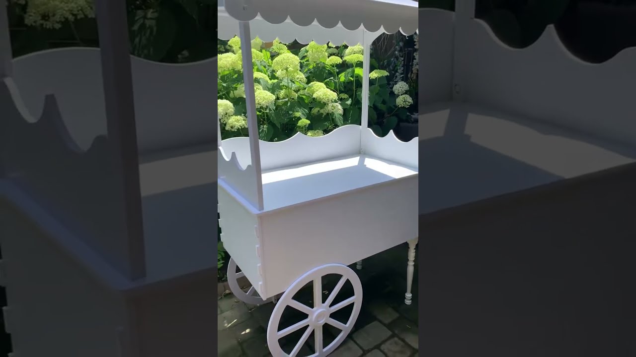 Last weekend’s white cart & flower stand rental 