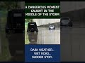 “A dangerous moment caught in the middle of the storm.” #environment #car #rainyday  #shortvideo