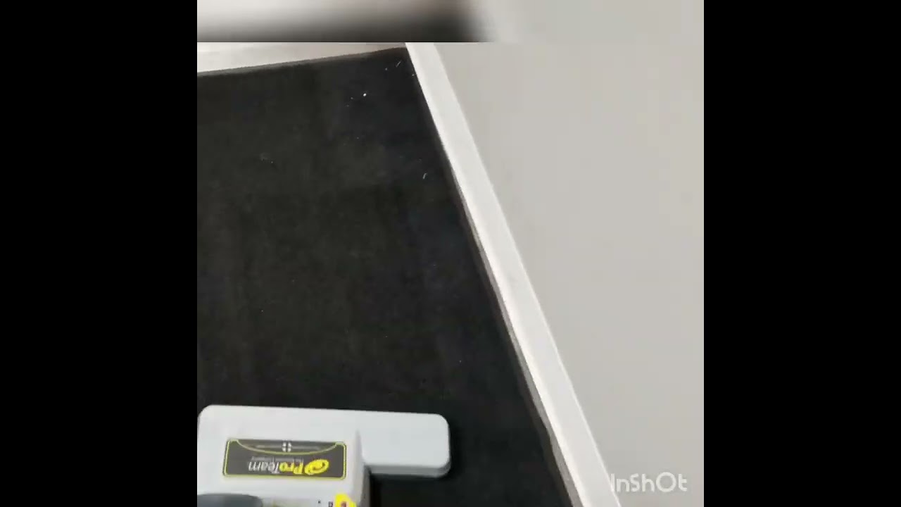 Commercial cleaning service Jeffersonville Indiana. vacuuming a rug in a Commercial building.