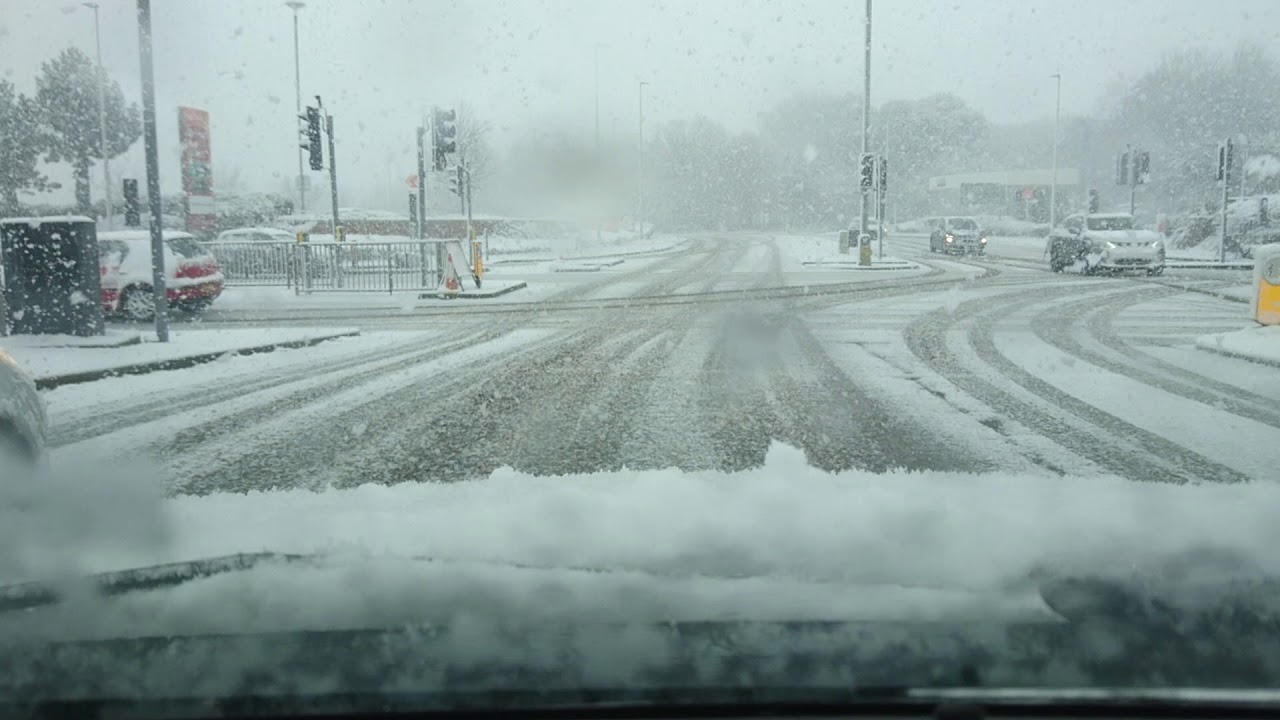 Cars jump red light after snow covered lights YouTube