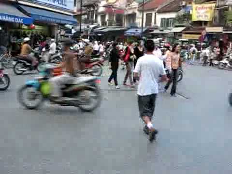 Vietnam — Crossing the road in Hanoi, Vietnam