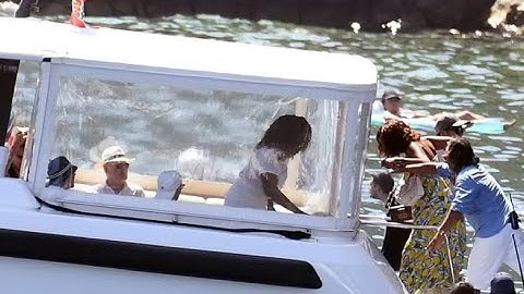 Oprah Winfrey displays her slimmed figure as she arrives by boat to restaurant on the Amalfi Coast.