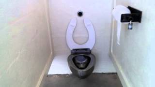 23.  Acorn Engineering Urinals and unbranded metal toilets.