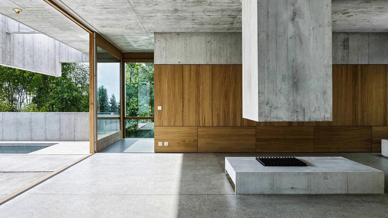 Concrete Fireplace and Walls Kirschgarten House by Buchner Bründler